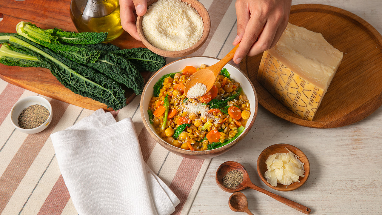 Spelt and Pulse Soup with Saffron, Tuscan Kale, Carrots, and Grana Padano