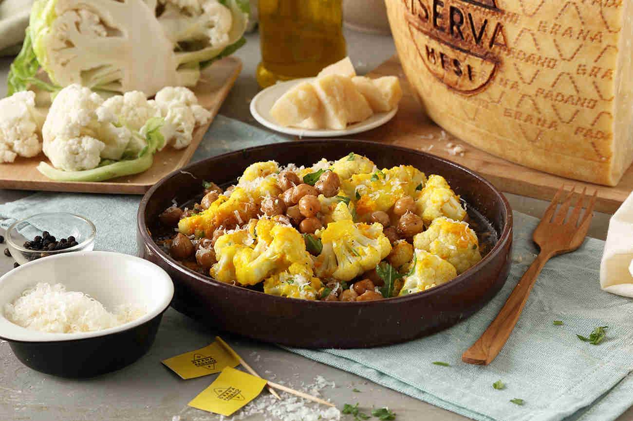 Cauliflower sautéed with turmeric, chick peas and Grana Padano Riserva 