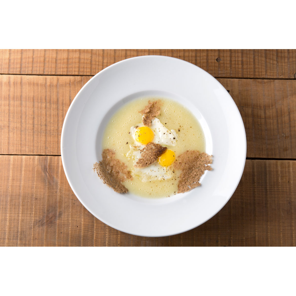 Crema di patate, cialde di lenticchie, uovo di quaglia e Grana Padano