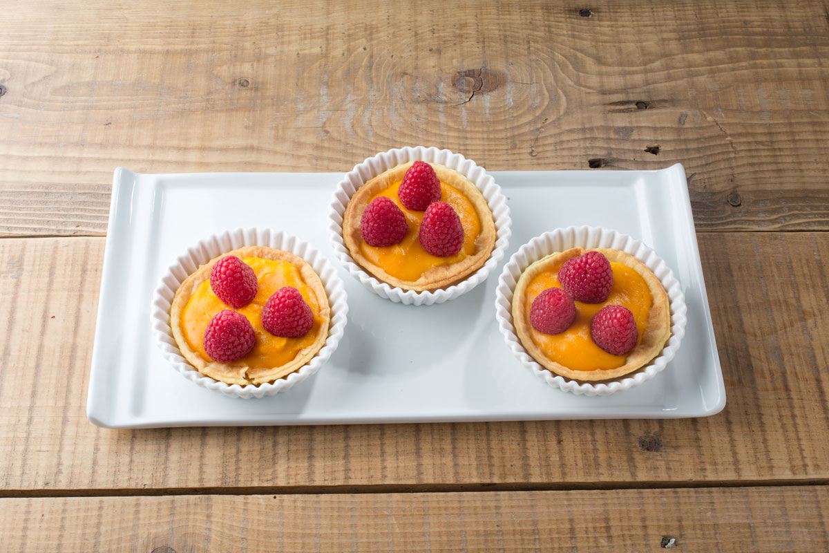 Tartaleta de calabaza y Grana Padano, miel y frambuesas