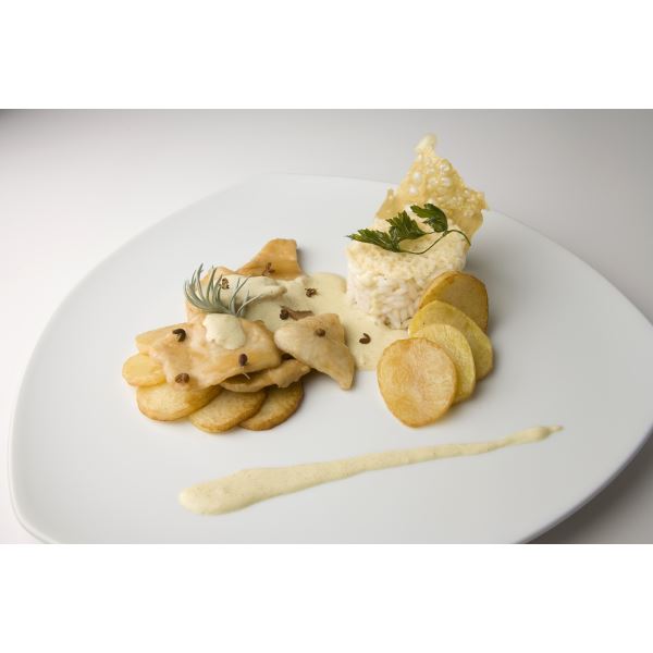 Pollo al curry con sformato di riso al Grana Padano