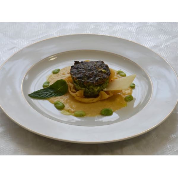 Flan di fave novelle e cicorie selvatiche su vellutata di ceci
