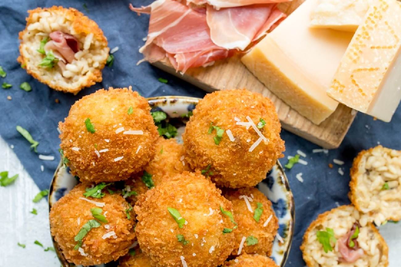 Mushroom and Grana Padano Arancini stuffed with Prosciutto di San Daniele