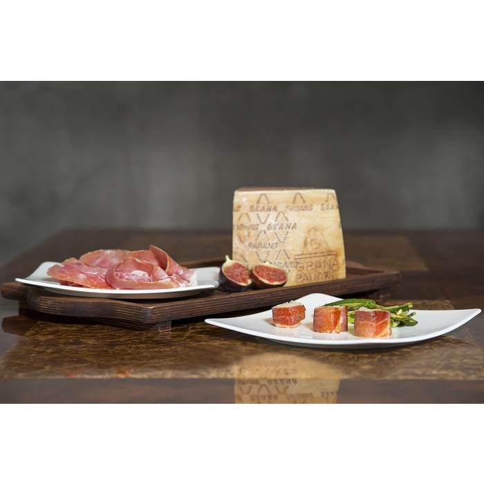 Risotto mit Grana Padano in Prosciutto di San Daniele und Ragout von grünem Spargel 