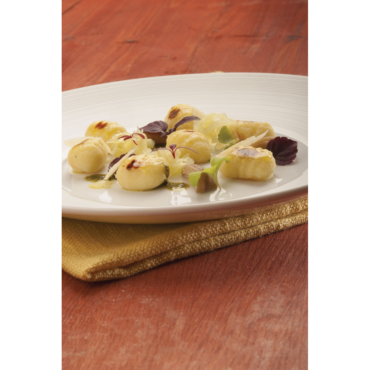 Gnocchetti di patate arrostiti, Grana Padano, verze e castagne