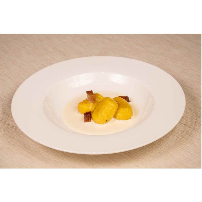 Friulian style potato gnocchi with Grana Padano fondue
