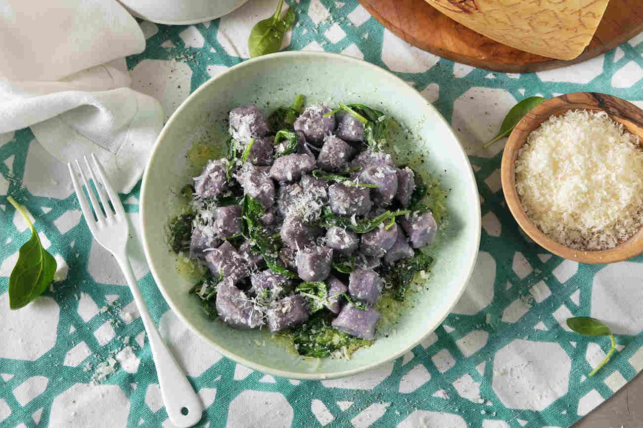 Purple Potato Gnocchi and Baby Spinach with Grana Padano Riserva 