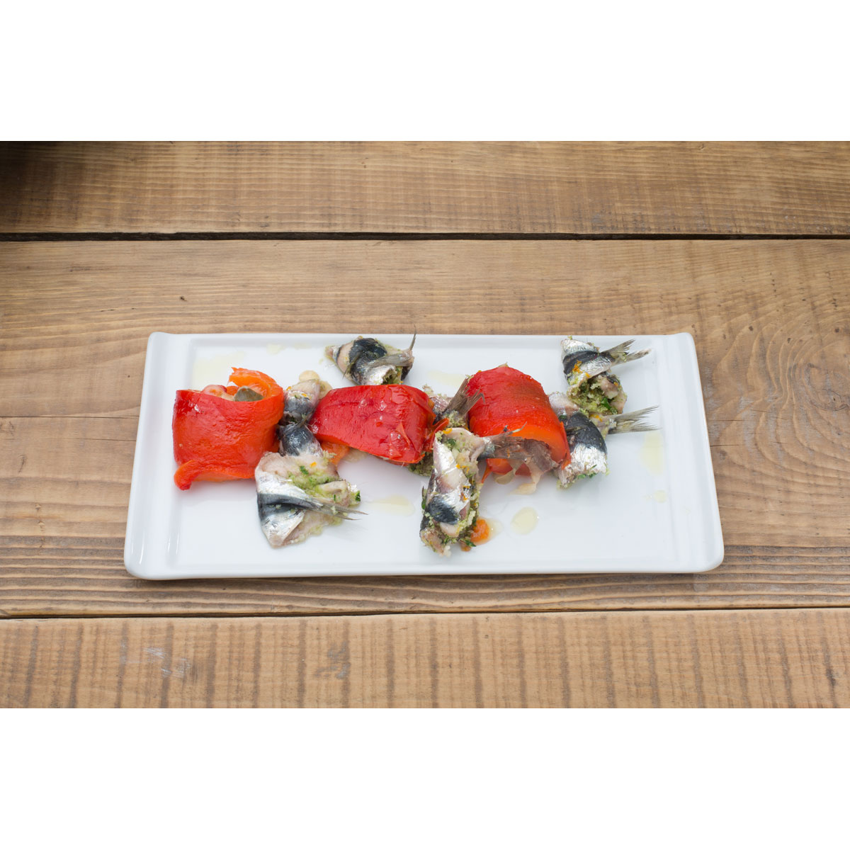 Involtini di sarde e peperoni al Grana Padano