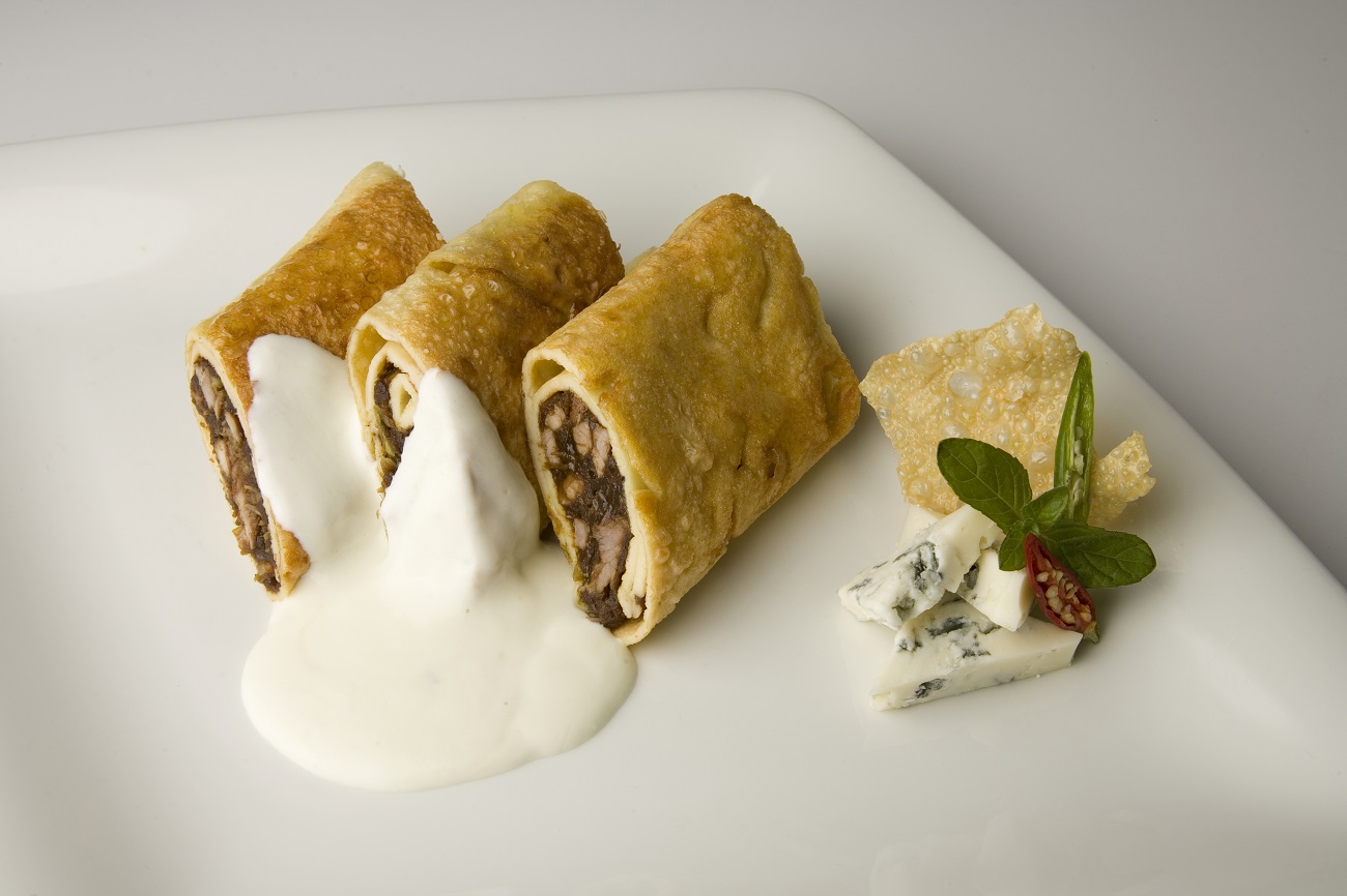 Pan-fried spring-rolls with Gorgonzola cream