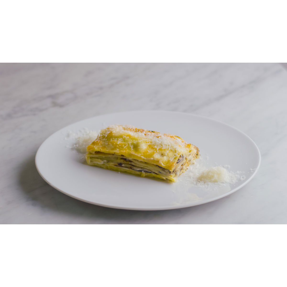 Lasagna bianca con melanzane e besciamella di Grana Padano