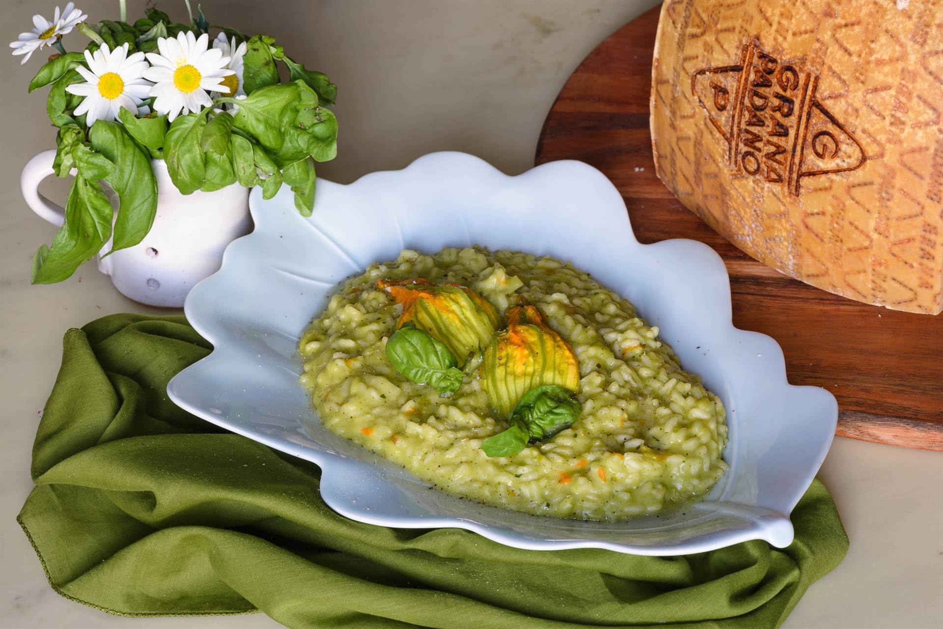Risotto with zucchini and stuffed blossoms