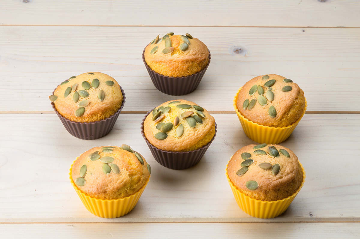 Muffin con pere, semi di zucca e Grana Padano