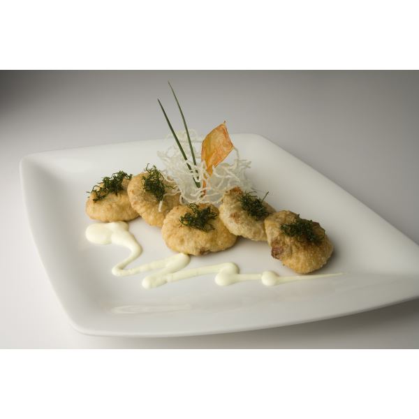 Mutton-and-Provolone Valpadana tarts in a Grana Padano fondue