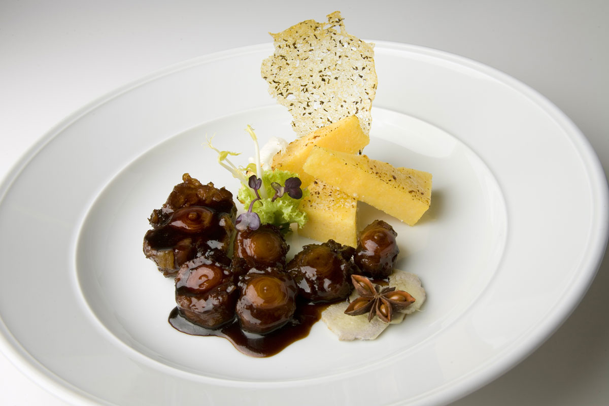 Oxtail simmered in red wine from Valtellina with crispy polenta and Grana Padano