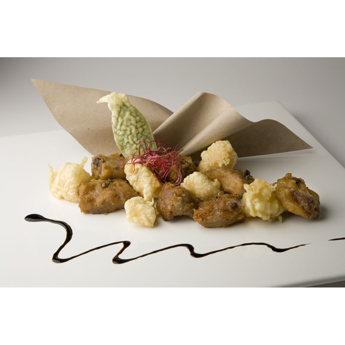 Pepper-salt pork spareribs with battered Grana Padano