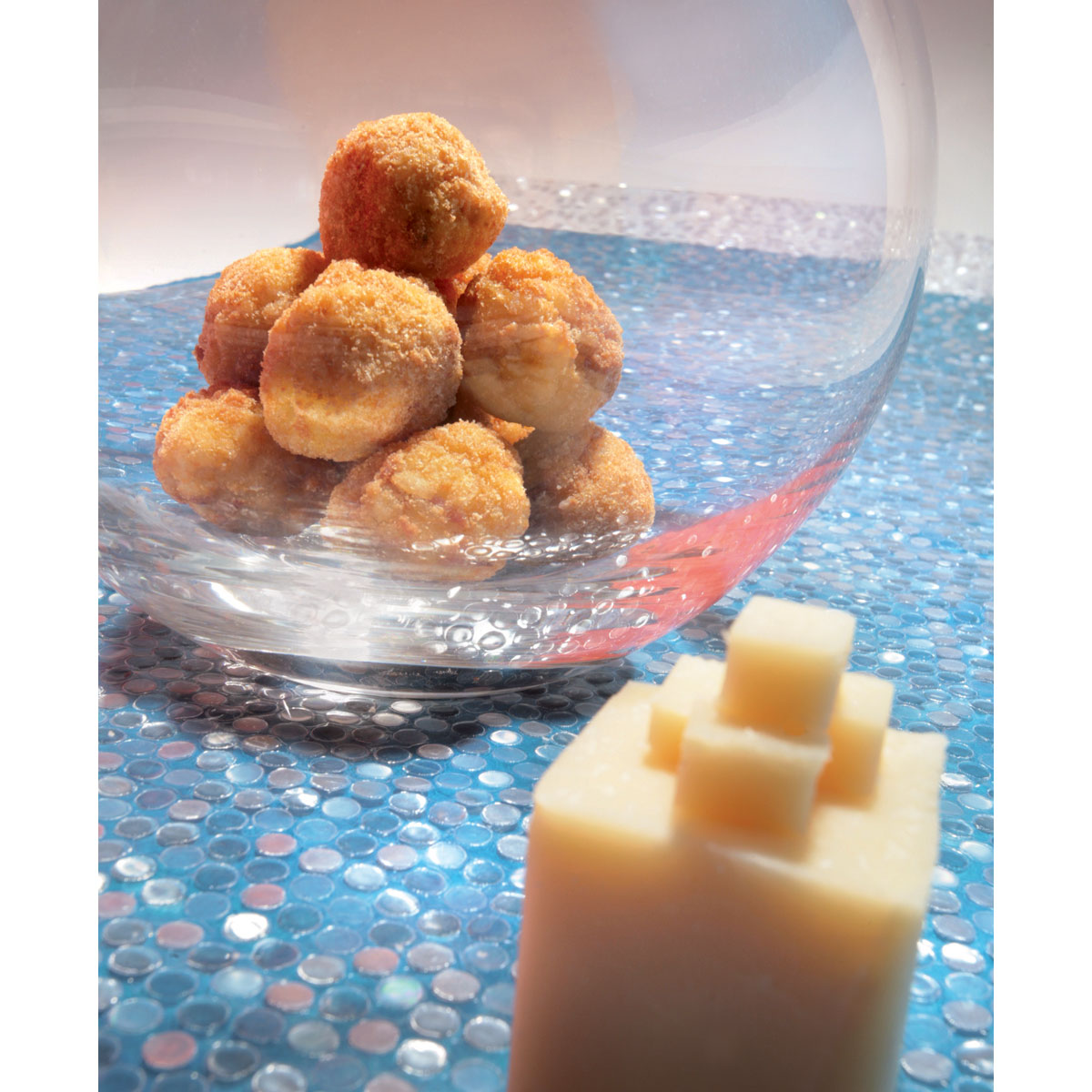 Piccoli arancini di riso allo speck e Grana Padano
