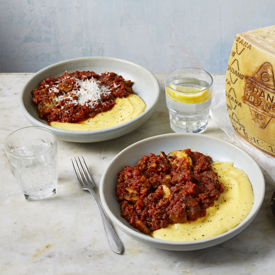 Sausage and mushroom ragù with Grana Padano polenta