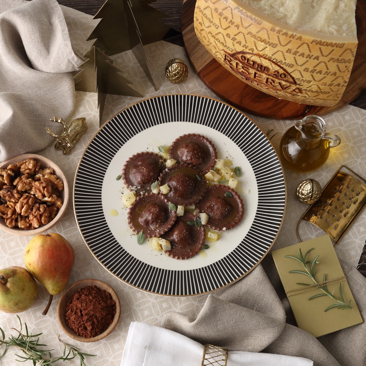 Ravioli al cacao ripieni di Grana Padano Riserva e pere