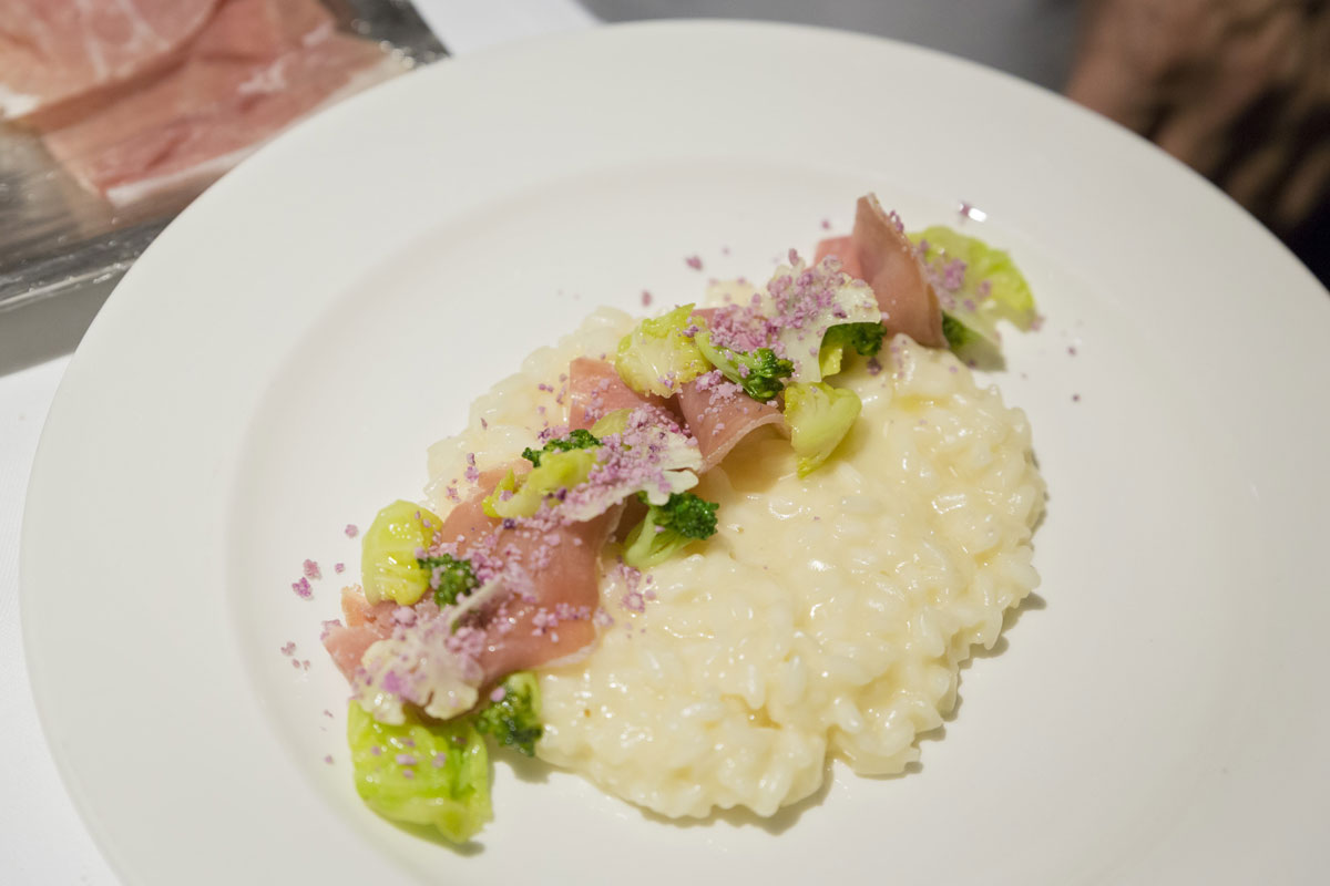Risotto with olive oil, Grana Padano, cauliflowers and Prosciutto di San Daniele