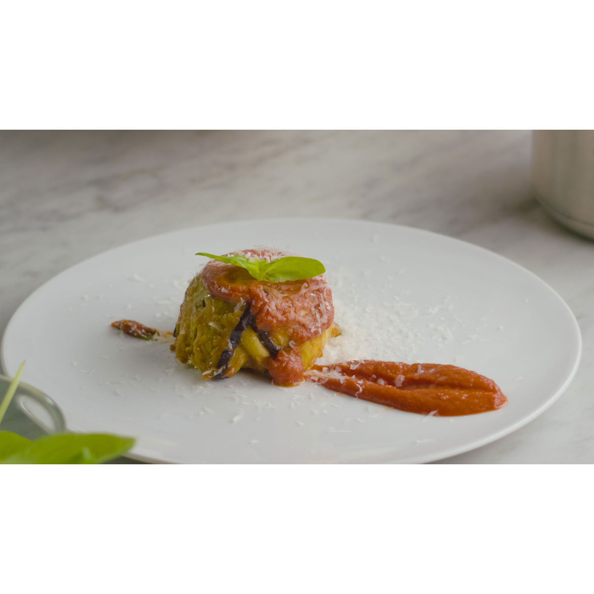 Baked Aubergine with tomato, basil and Grana Padano