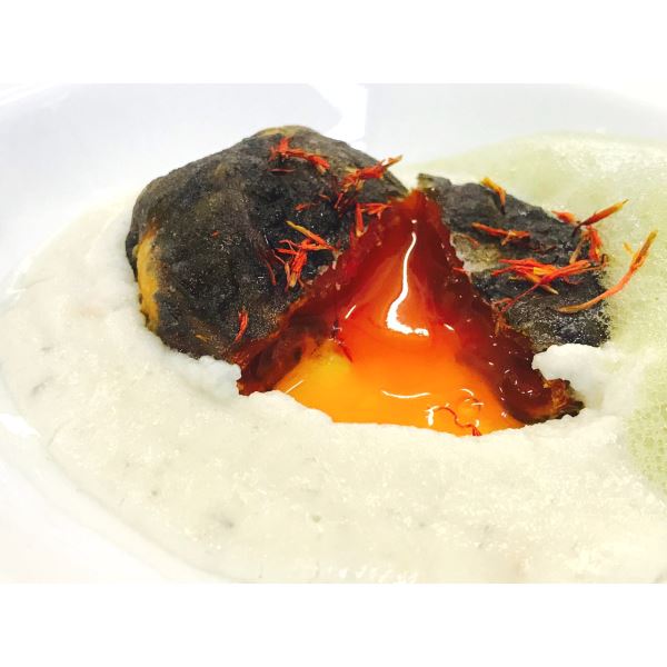 Tuorlo marinato con fonduta di Grana Padano
