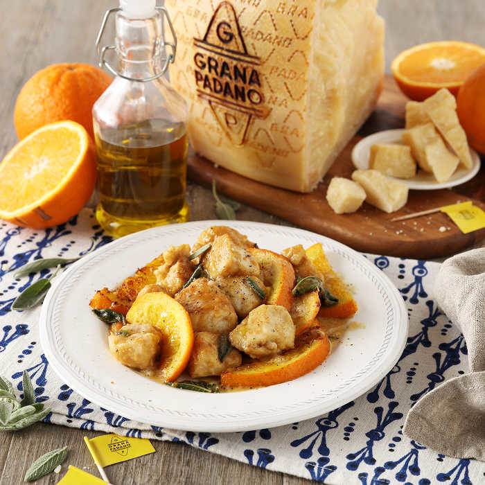 Orange juice chicken casserole with sage and Grana Padano 