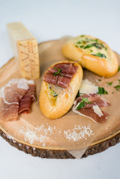 Spinach and mushroom baked egg boats with Grana Padano and Prosciutto di San Daniele