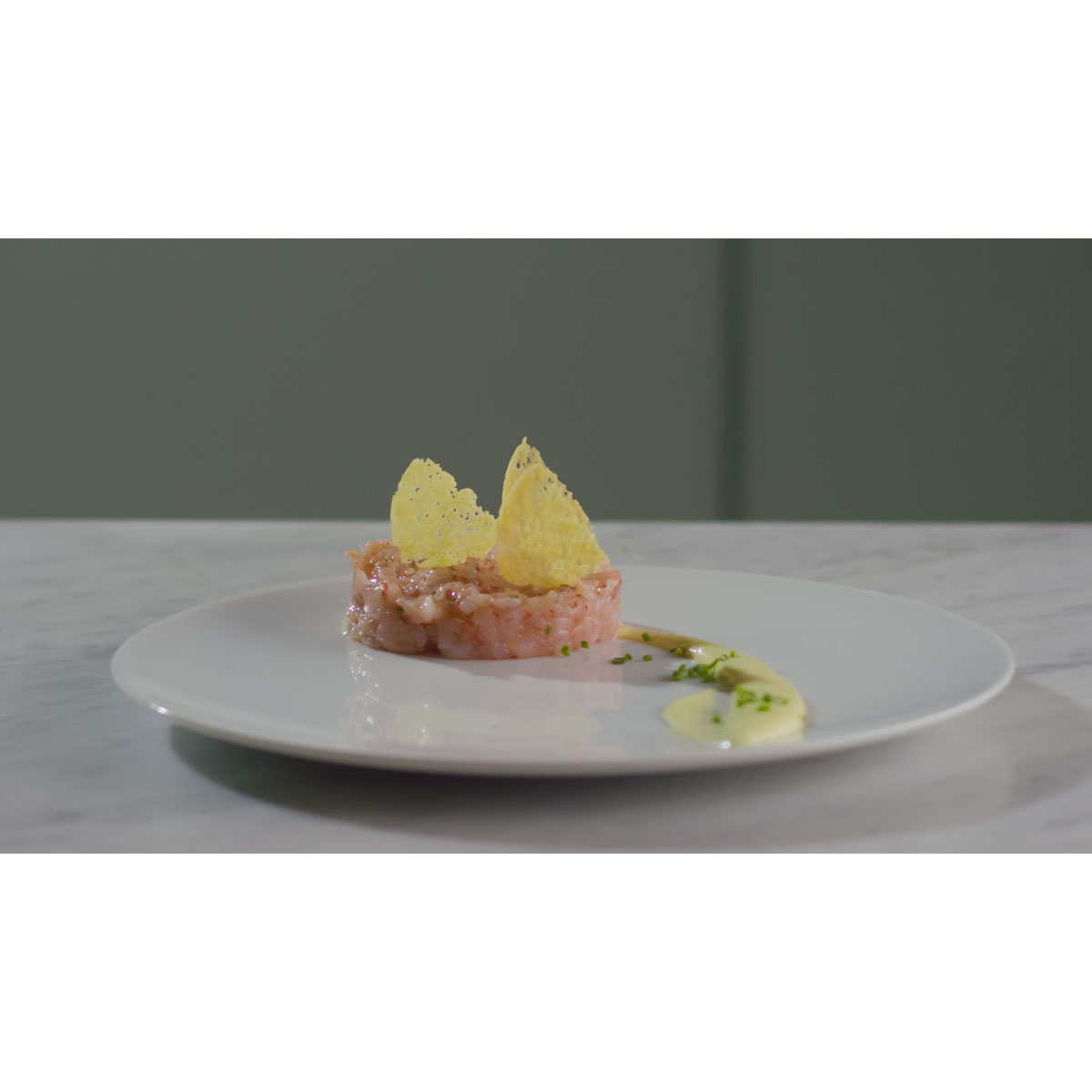 Prawn tartare with Grana Padano wafer and lime mayonnaise