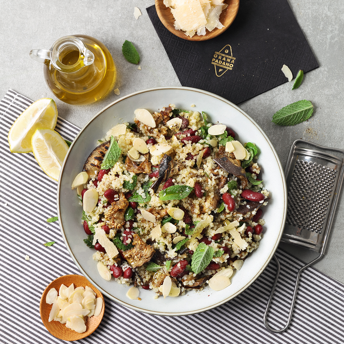 Tabbouleh with grilled aubergine, red kidney beans, mint, almonds, ginger and Grana Padano Riserva