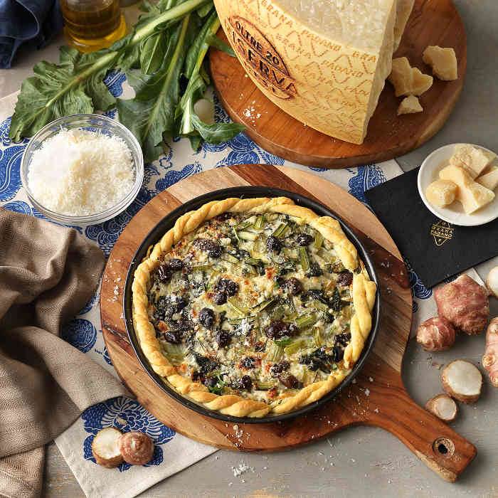 Torta salata con catalogna, topinambur, ricotta fresca e Grana Padano Riserva 