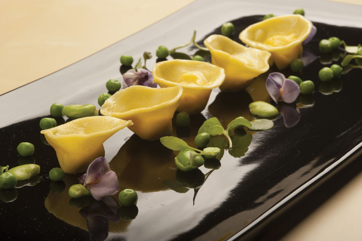 Tortelli al Grana Padano, piselli e fave