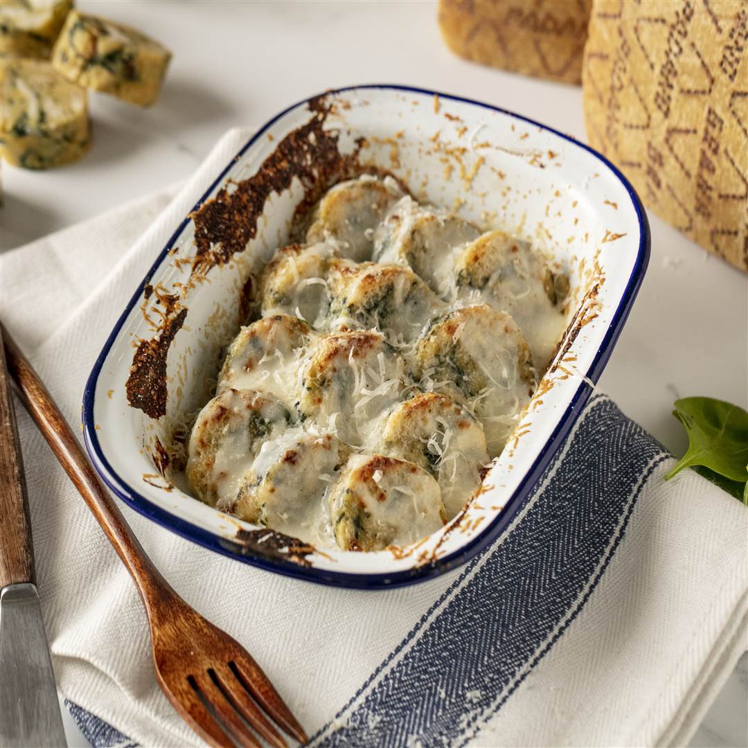 Gnocchi con Grana Padano, pan y espinacas