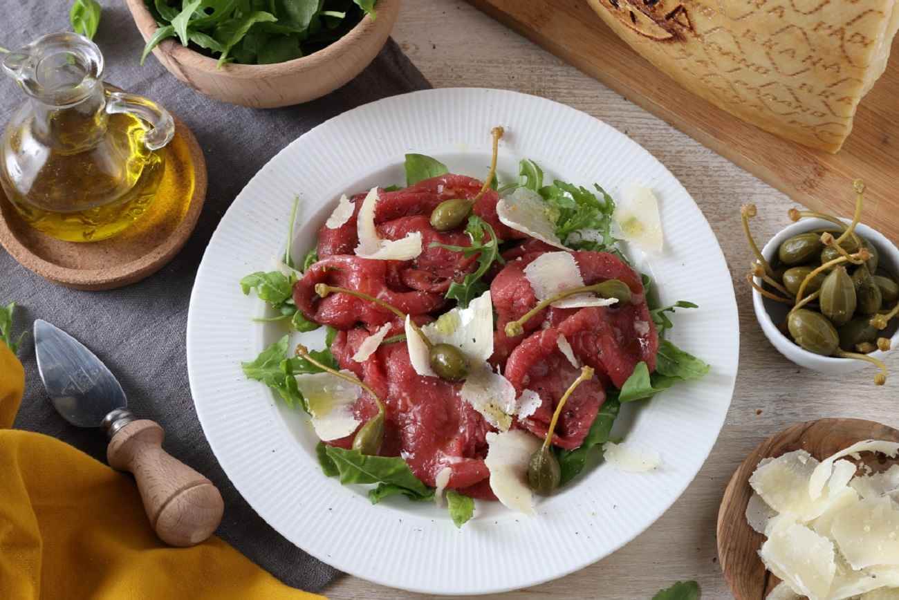Beef Carpaccio with Capers, Rocket and Shavings of Grana Padano RISERVA