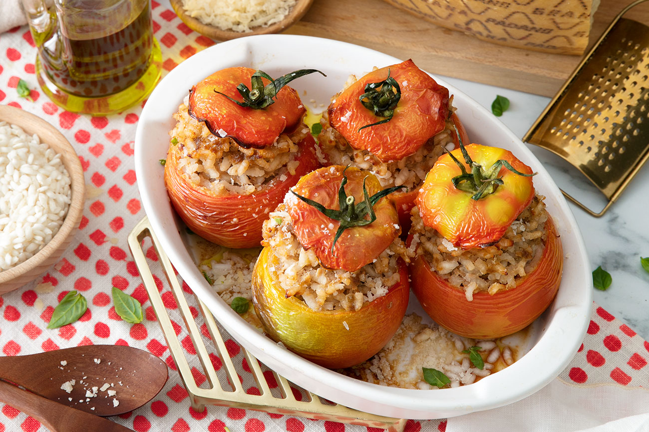 Baked Beefsteak Tomatoes Stuffed with Rice, Minced Meat and Grana Padano Riserva