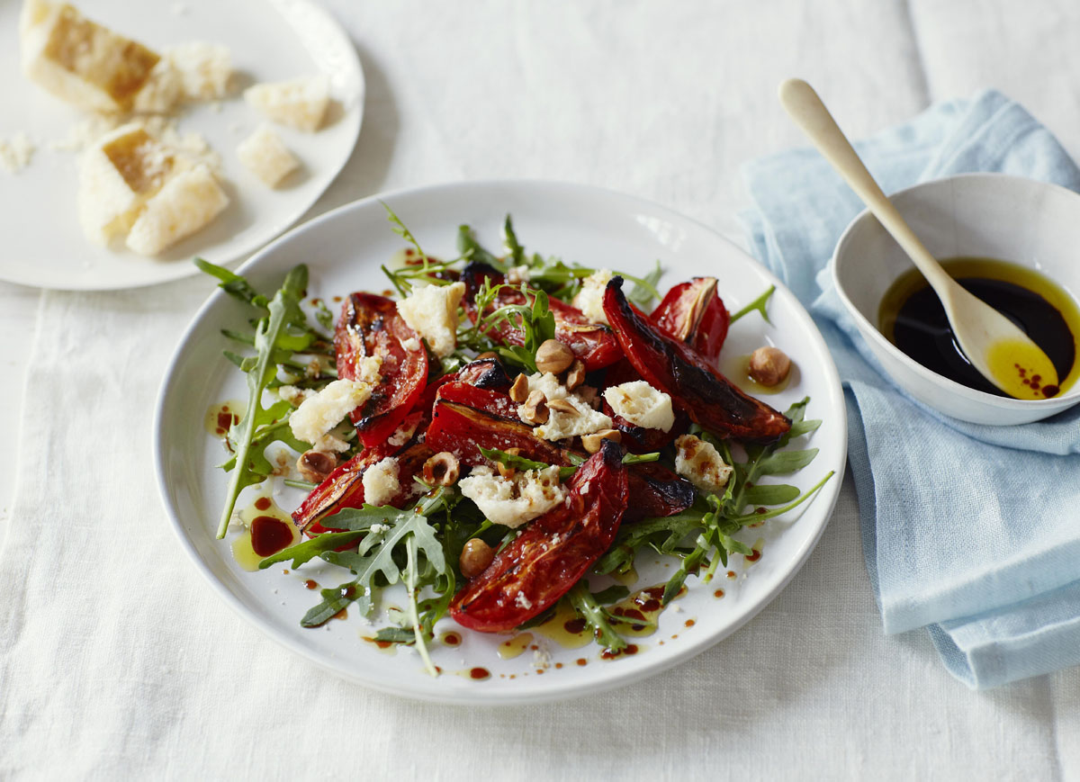 Grana Padano honeycomb with roasted tomatoes, rocket and hazelnut