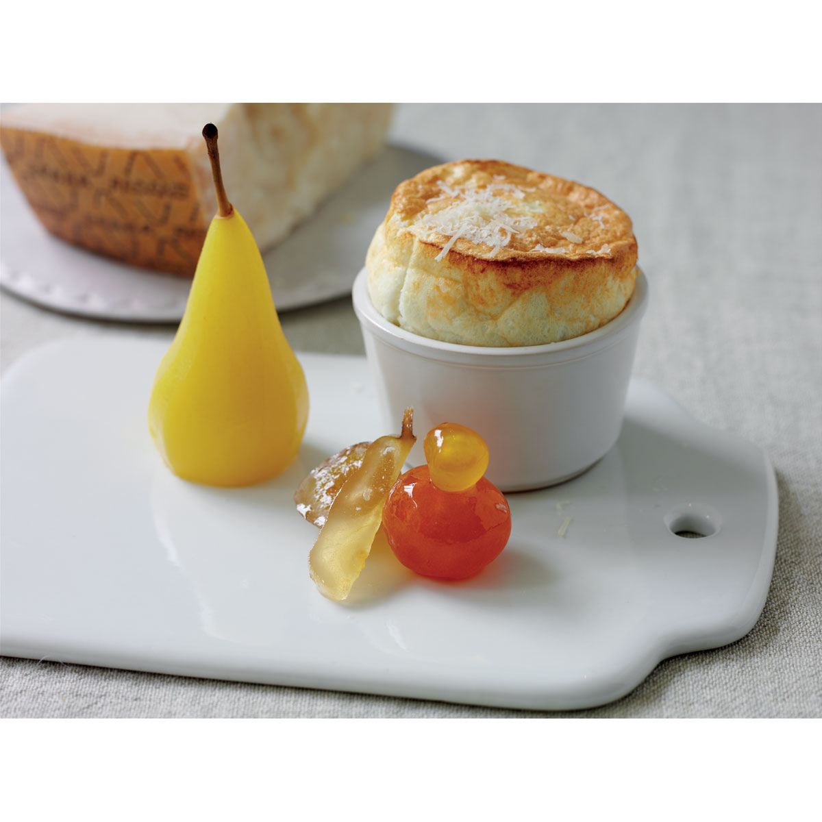 Grana Padano Riserva soufflé with fruit mustard & poached pears