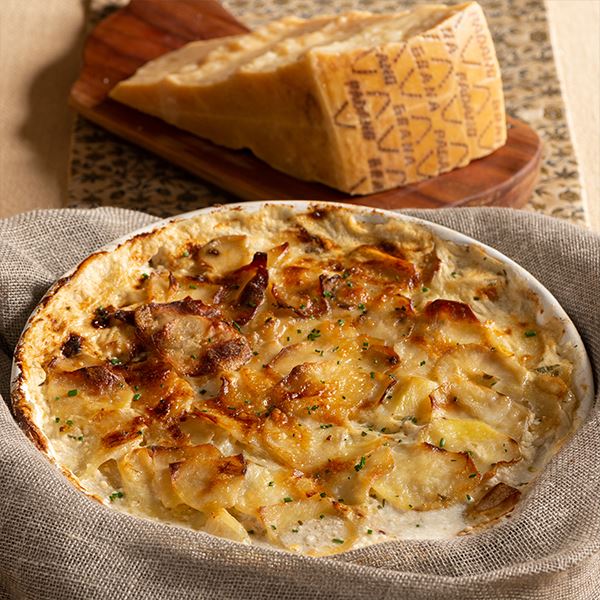 Baked salted cod, potatoes, anchovies and Grana Padano PDO