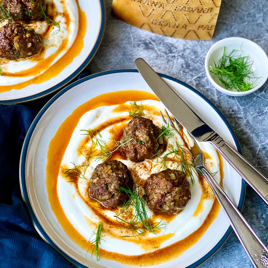Grana Padano Mediterranean meatballs with burnt chili butter on Greek yogurt