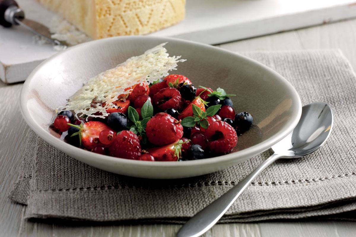 Wild berry salad with basil, mosto cotto, sichuan pepper & Grana Padano crisps