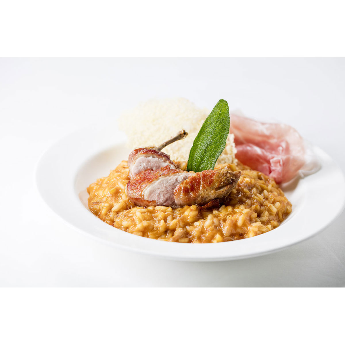 Quail & Grana Padano risotto with prosciutto di San Daniele
