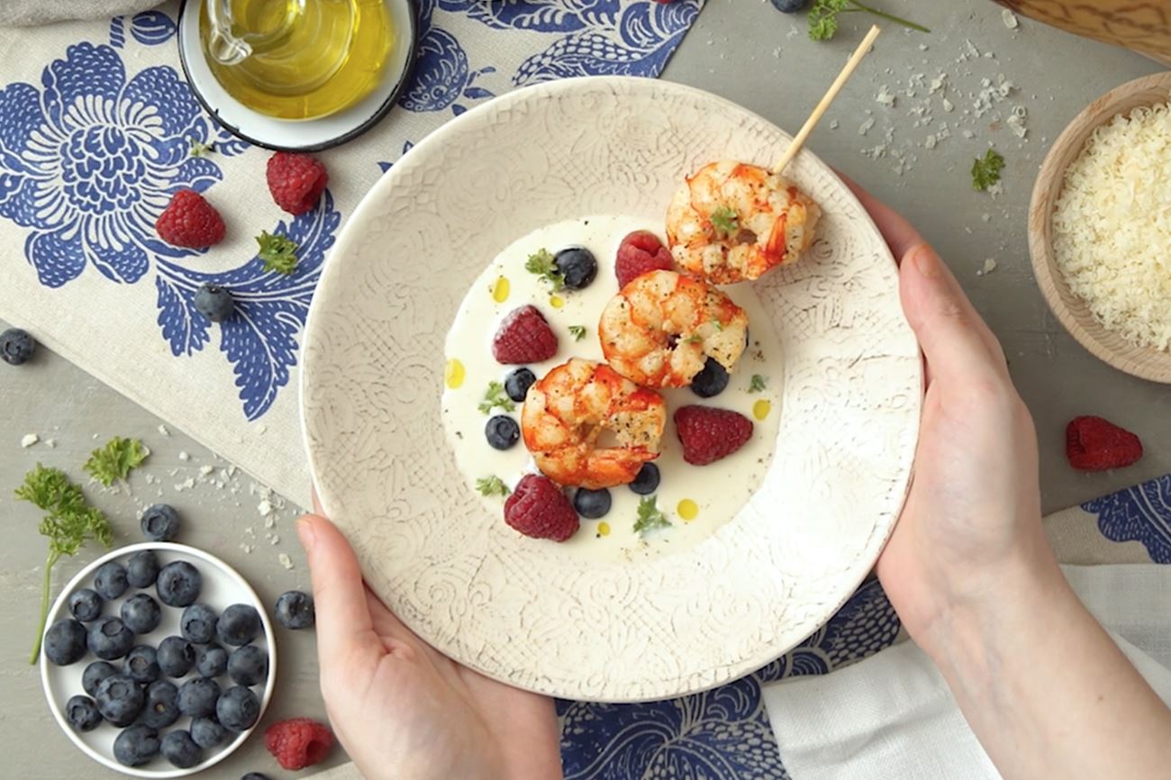 Langostinos con Grana Padano Riserva y frutas del bosque