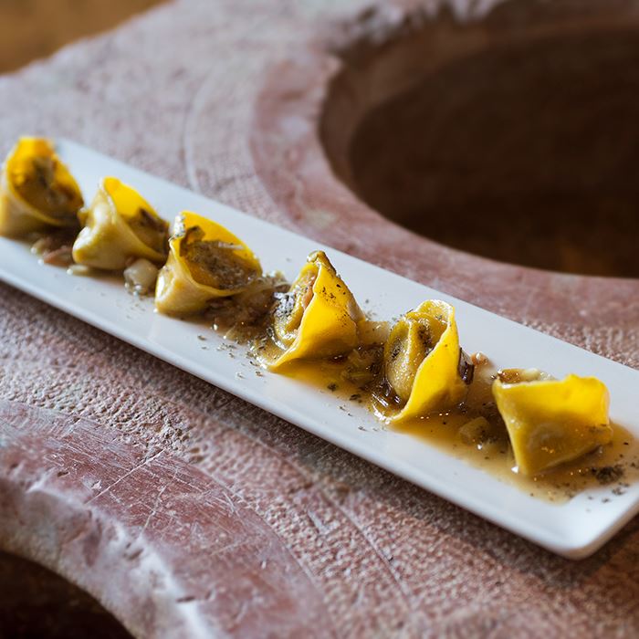 Cappelletti ripieni di capretto con sugo di lenticchie alla maggiorana e Grana Padano Riserva 24 mesi