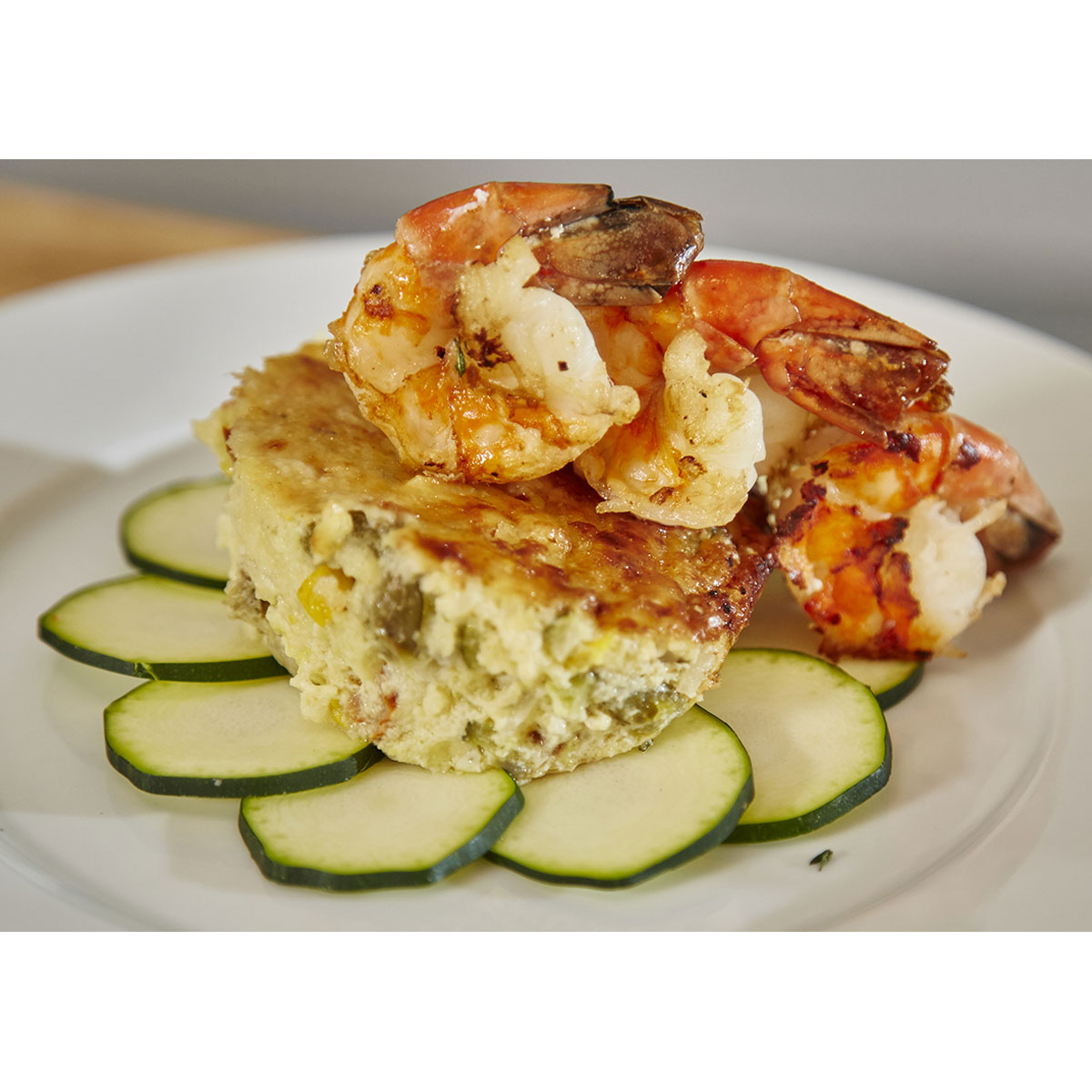 Zucchini/Courgette Flan with Scampi and Olive Vinaigrette